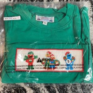 2t smocked Sesame Street shirt. New in bag , never worn